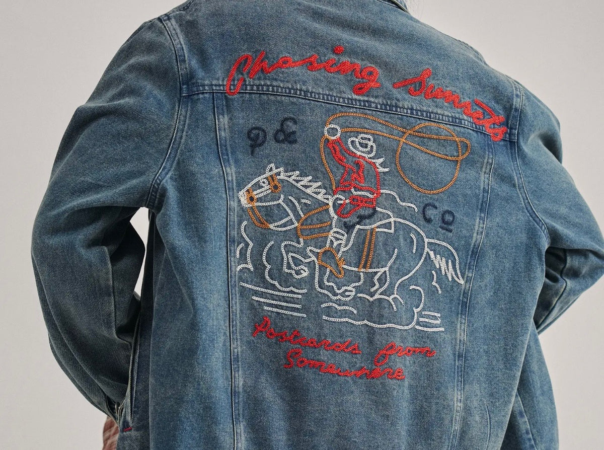 Medium Wash Denim Jacket with Embroidered Roping Cowboy Back Graphic